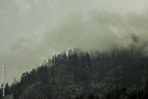 heavy cloud in the rocks mountains