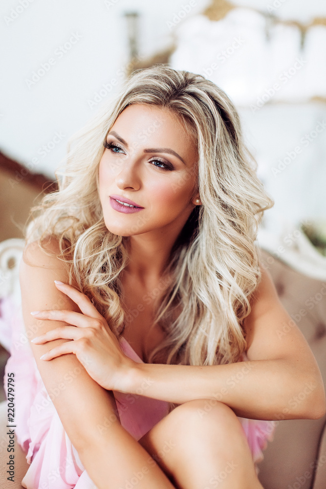 Sexy beautiful blonde woman in pink underclothes Sexy beautiful blonde woman in pink underclothes