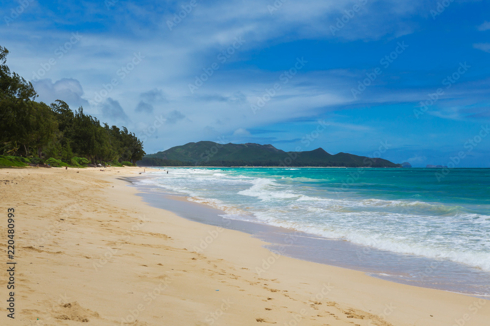 Beautiful Waimanalo beach with turquoise water and cloudy sky, Oahu coastline, Hawaii Beautiful Waimanalo beach with turquoise water and cloudy sky, Oahu coastline, Hawaii