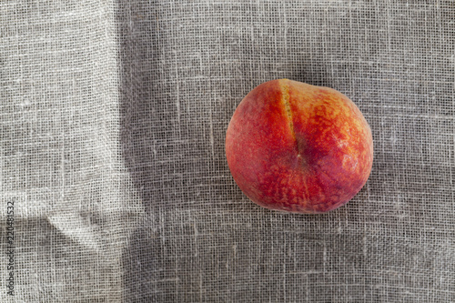 one ripe large peach photo