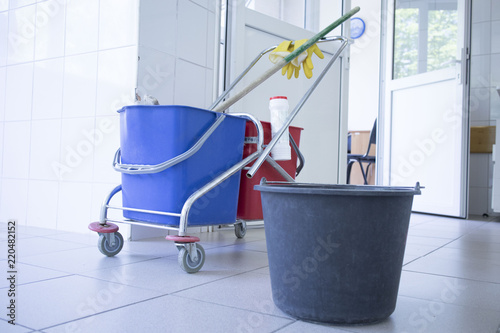 Cleaning trolley in the corridor of the hospital. cleaning equipment in the hospital. concept of pandemic, coronavirus, virus, disinfection, panic.