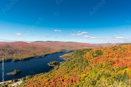 This is a picture of autumn leaves seen from the National Park "Mont-Tremblant" in Quebec, Canada. This is a picture taken from the observation stand of the trail course # 3 "La Roche". This year it i