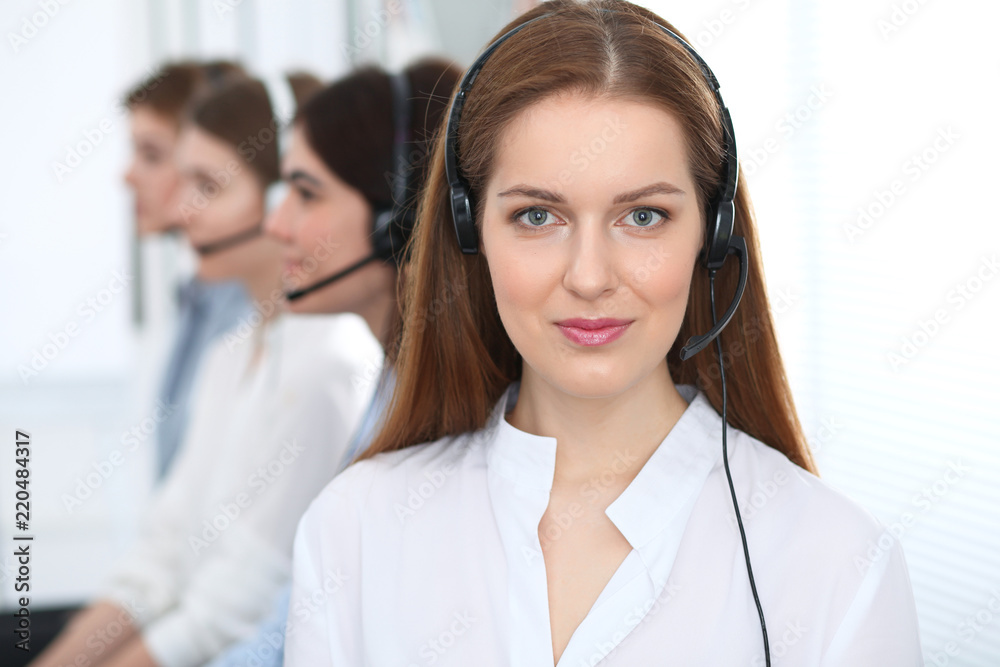 Call center. Beautiful cheerful smiling operator consulting clients with headset. Business concept of customer service Call center. Beautiful cheerful smiling operator consulting clients with headset. Business concept of customer service
