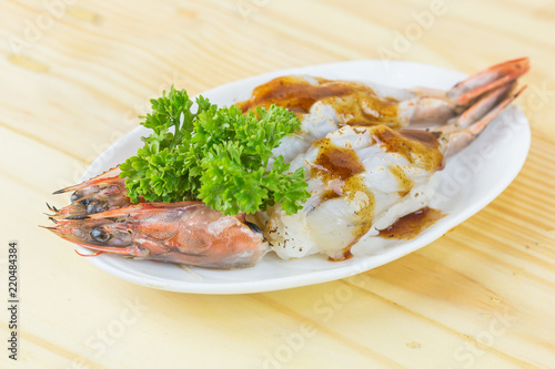 fresh grilled shrimps served on a plate