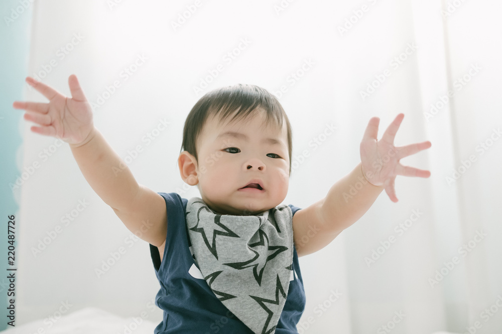 Portrait of a baby on the bed. Happy and fun. Portrait of a baby on the bed. Happy and fun.