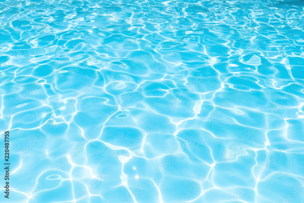 Wonderful blue and bright ripple water and surface in swimming pool, Beautiful motion gentle wave in pool for blue abstract or nature background
