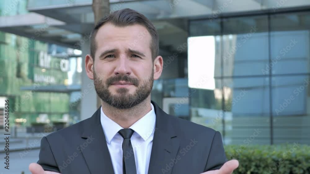 Beard Businessman Upset by Loss while Working in Office Beard Businessman Upset by Loss while Working in Office