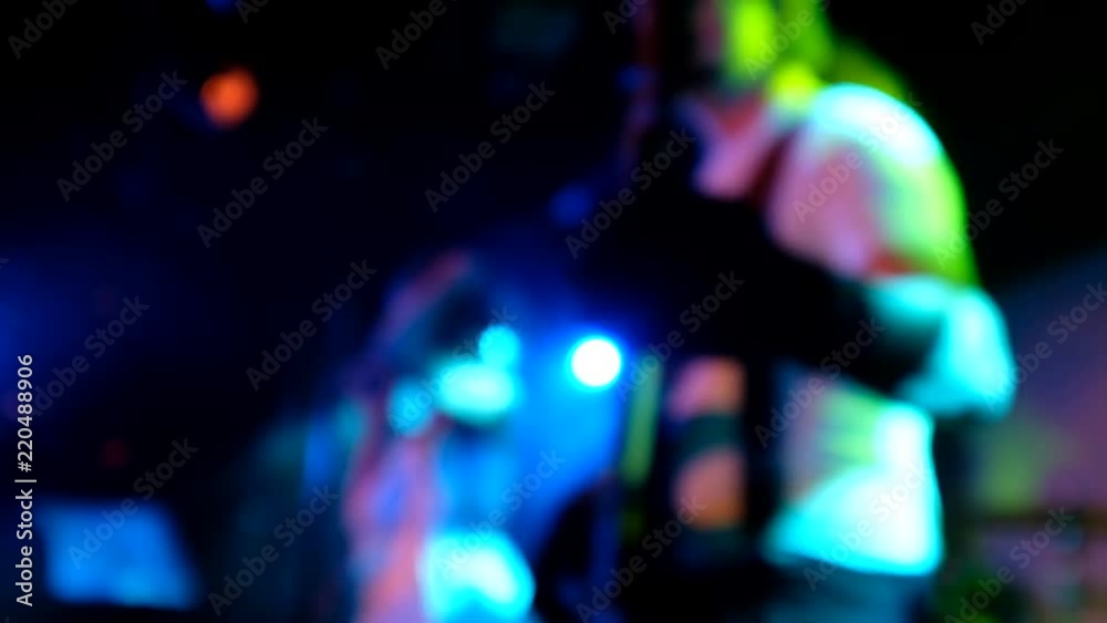 Music band performing live at night club, blurred Music band performing live at night club, blurred