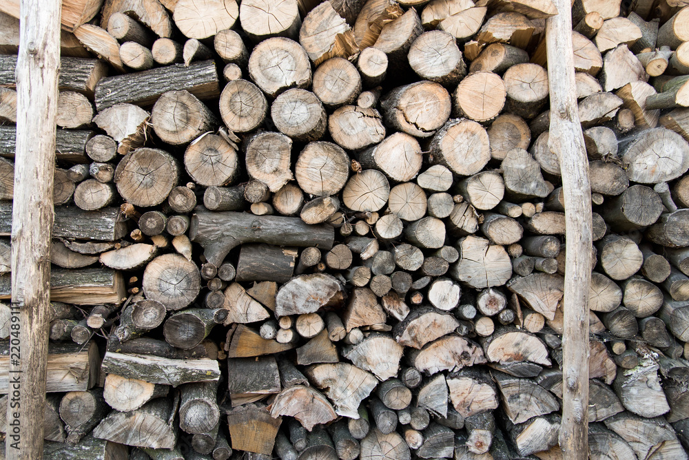 Firewood for the winter, stacks of firewood, pile of firewood. Firewood for the winter, stacks of firewood, pile of firewood.