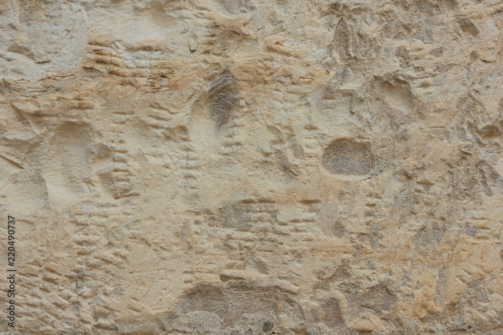 Texture old wall. Surface of an ancient temple in Prague. Background of stone for the designer. Vintage pattern