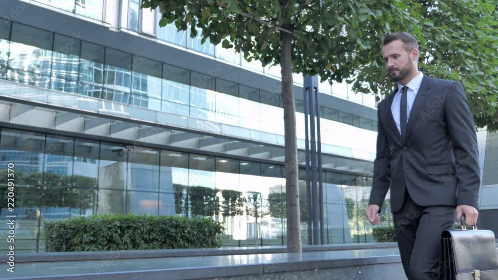 Businessman Coming and Sitting Outside Office Businessman Coming and Sitting Outside Office