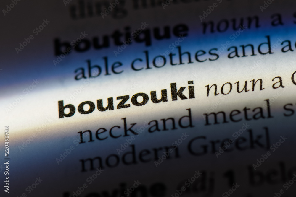 bouzouki word in a dictionary. bouzouki concept. bouzouki word in a dictionary. bouzouki concept.