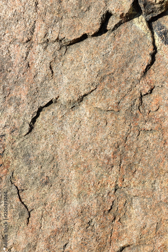 Granite background. Granite stone close up. Texture of natural material. Rocky rocks of ancient times. Natural pattern Granite background. Granite stone close up. Texture of natural material. Rocky rocks of ancient times. Natural pattern