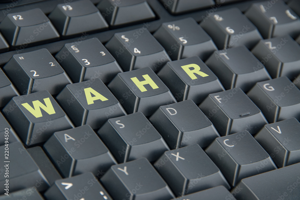 Schriftzug wahr auf einer PC Tastatur Schriftzug wahr auf einer PC Tastatur