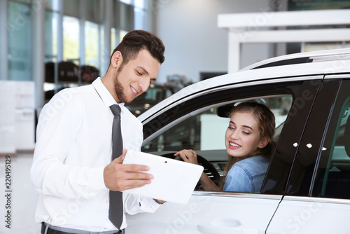 Woman sitting on driver's s...