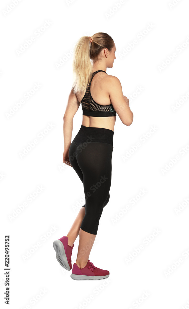 Young female runner exercising on white background Young female runner exercising on white background