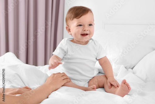 Cute little baby playing wi...