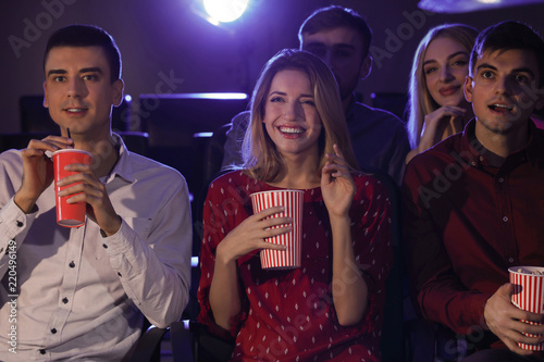 Young people watching movie...