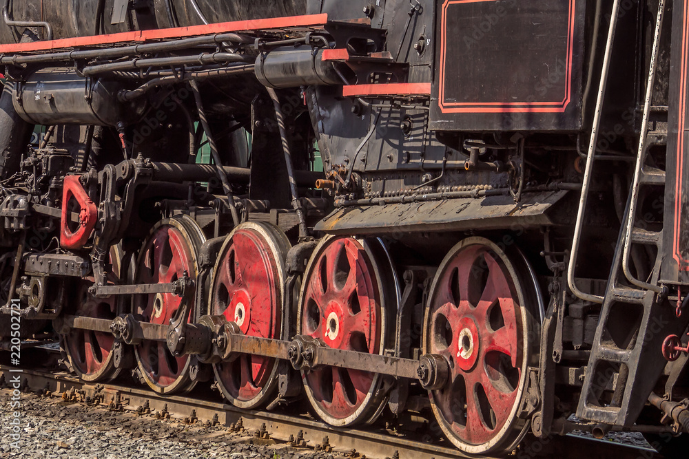 Wheels of old steam locomotive.