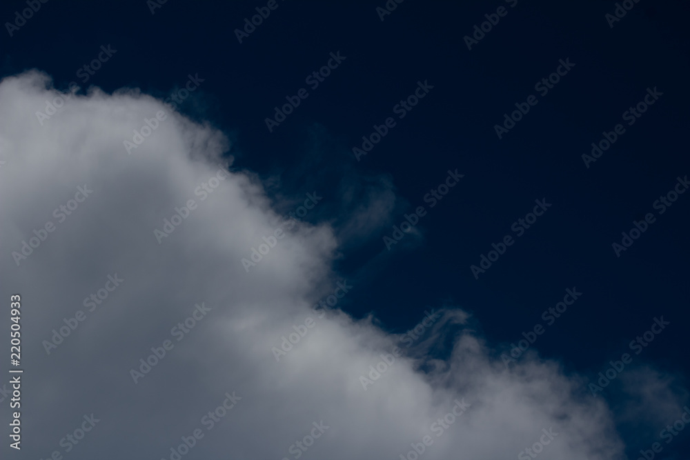 white cumulus blurred cloud on dark blue sky white cumulus blurred cloud on dark blue sky