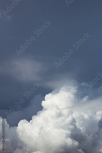 Wallpaper Mural white blurred cumulus clouds on dark blue sky Torontodigital.ca