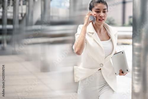 business woman running in rush hour. motion blur.
