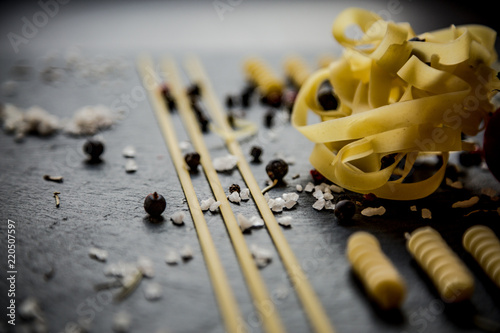Close up of pasta with aromatic herbs and spices / Knolling concept