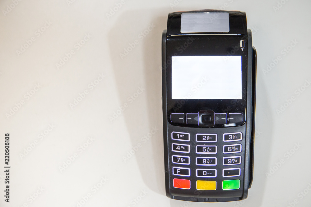 Close credit card swiping machine to pay. credit card swipe through terminal for payment in cafeteria. Close credit card swiping machine to pay. credit card swipe through terminal for payment in cafeteria.