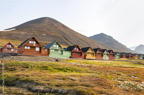Colorful wooden houses along the road in summer at Longyearbyen, Svalbard. photo