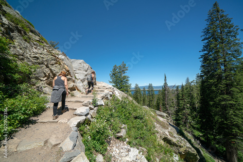 Hiking through Cascade Canyon Trail to Hidden Falls of Grand Teton National Park, Wyoming USA.