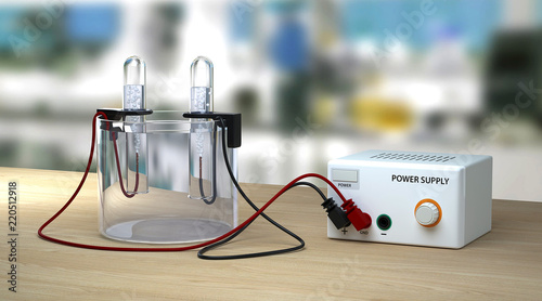 Fotografie Electrolysis of water on wooden table in lab
