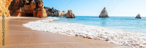 Summer sandy beach (Algarve, Costa Vicentina, Portugal).  Beautiful natural summer vacation travel concept.