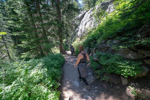Hiking through Cascade Canyon Trail to Hidden Falls of Grand Teton National Park, Wyoming USA.