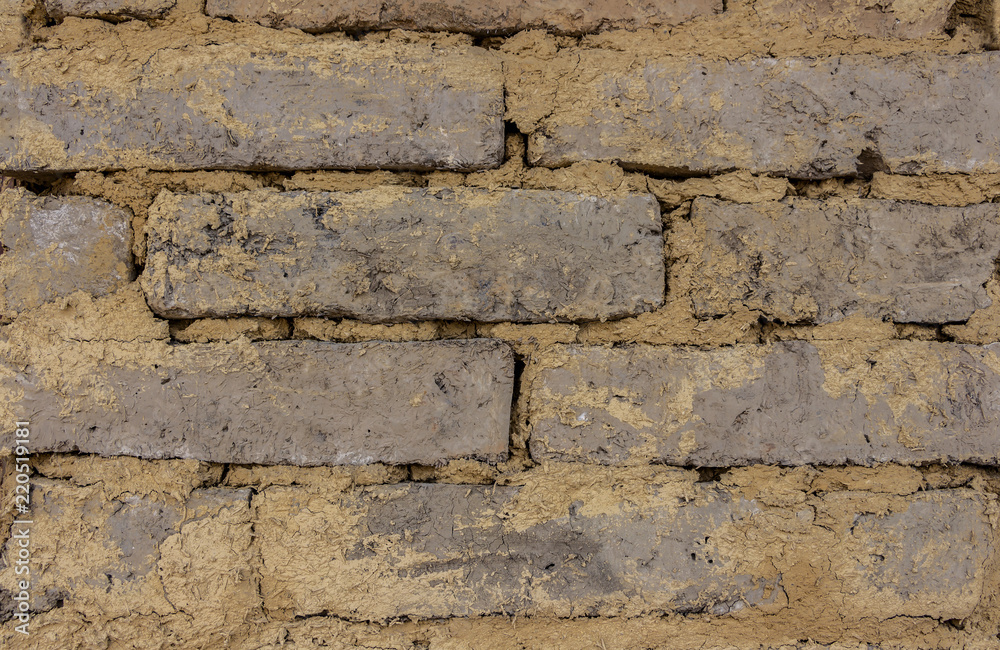 The walls are created from natural clay. Clay into a square to build a wall or a house.