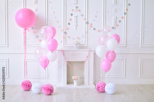 Children birthday. Decorations for holiday party. A lot of balloons pink and white colors. 