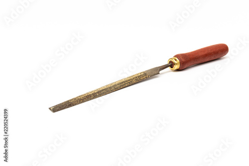 used metal rasp with wooden handle on white background