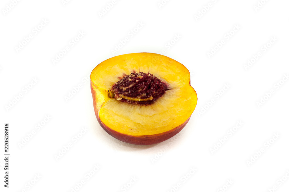 Peach or nectarine isolated on white background in closeup Peach or nectarine isolated on white background in closeup