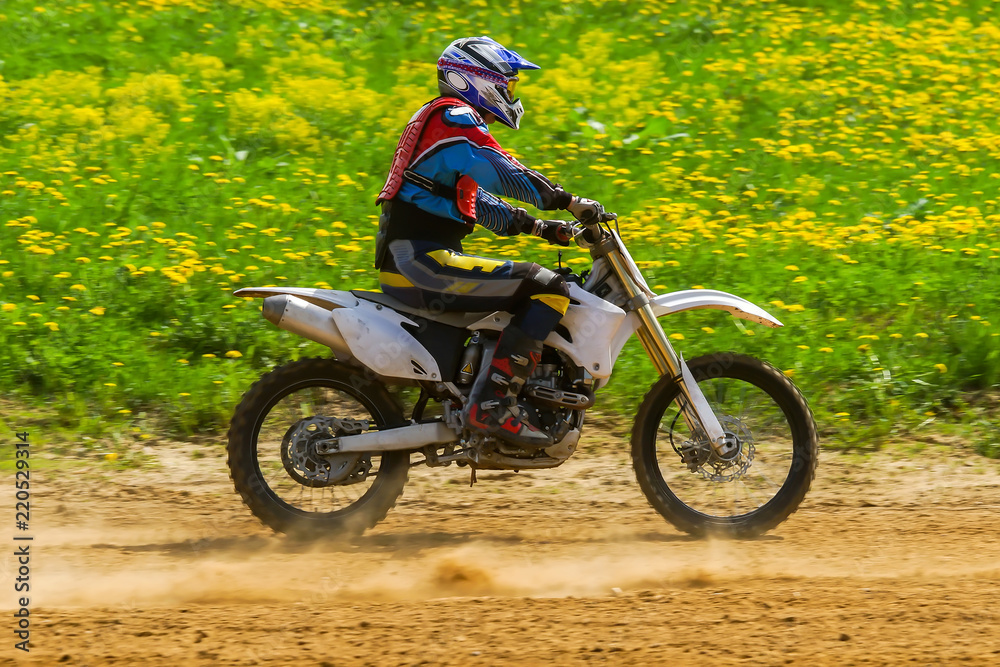 Motocross rider in the action