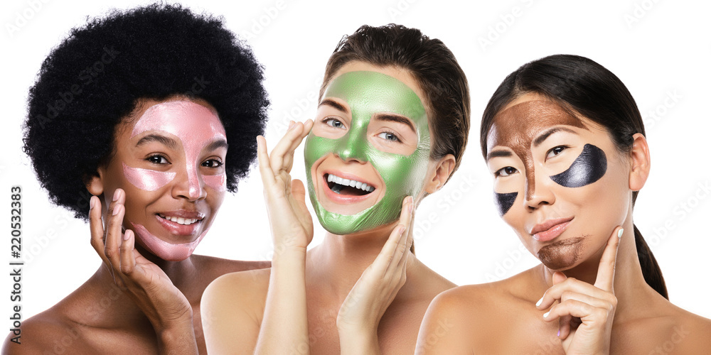 Beautiful multi-ethnic girls with colorful peel-off masks on their faces Beautiful multi-ethnic girls with colorful peel-off masks on their faces