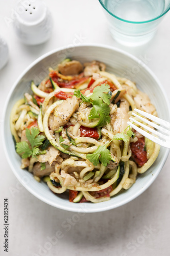 Vegetarian stir fry with chilli & coriander soya chunks with spiralled courgette spaghetti and semi dried tomatoes 