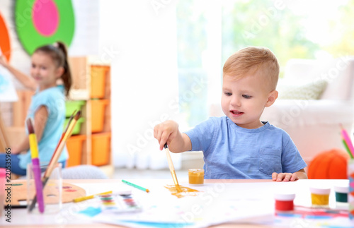 Little boy and blurred girl...