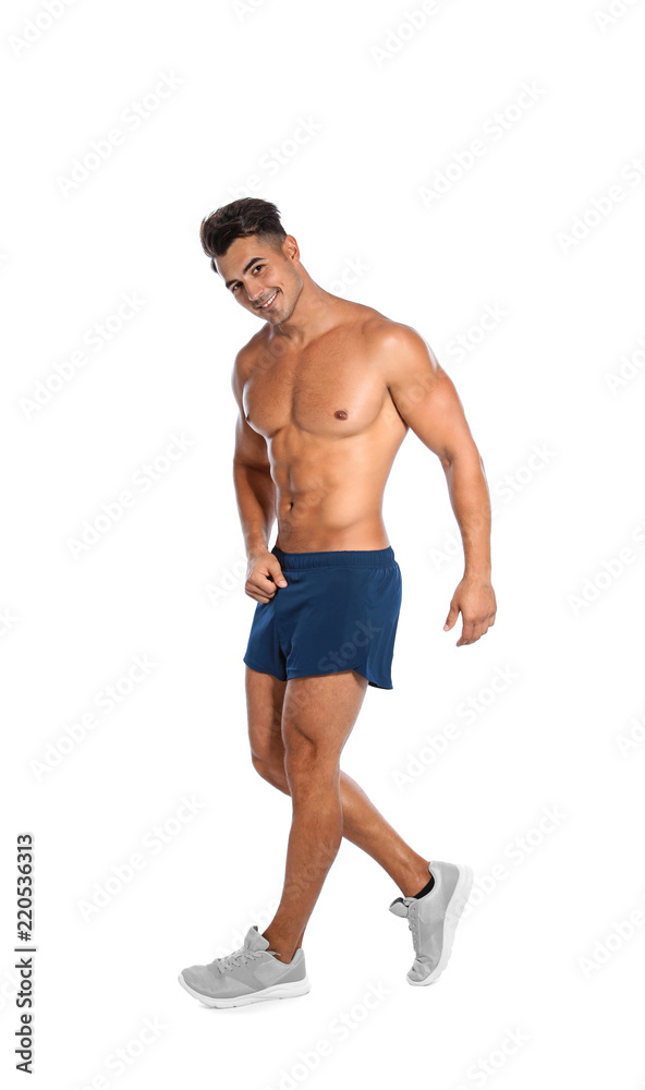 Handsome young runner posing on white background Handsome young runner posing on white background
