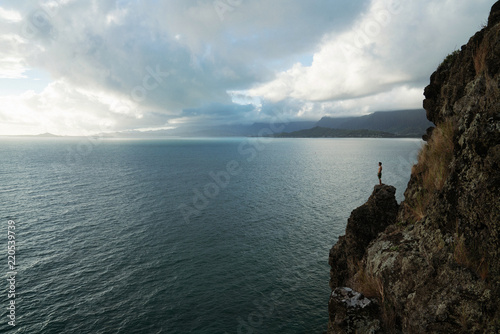 man in front of majestic landscape