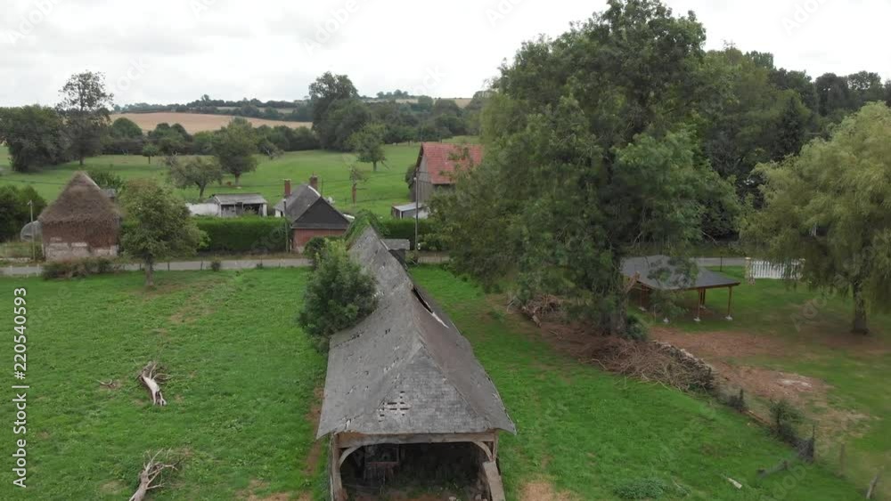 Old farm in romantic French landscape, aerial.