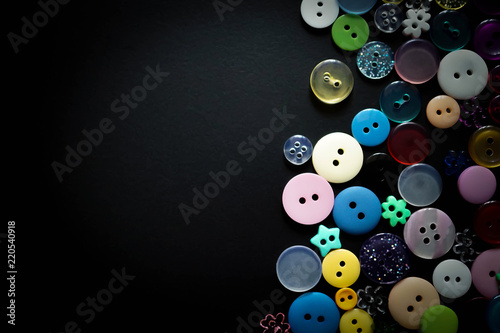 assorted shape sewing buttons in black background