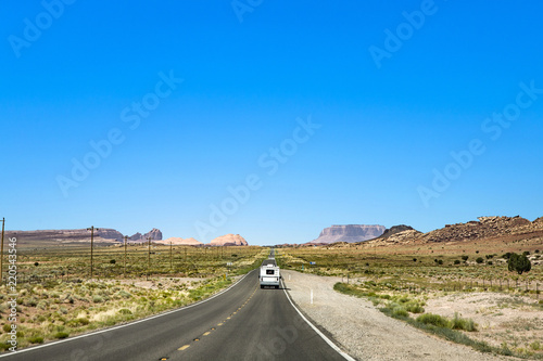 people travel with caravan to the moument valley photo