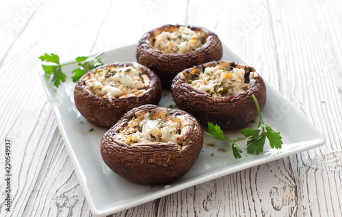 Mushrooms stuffed with cheese and greens