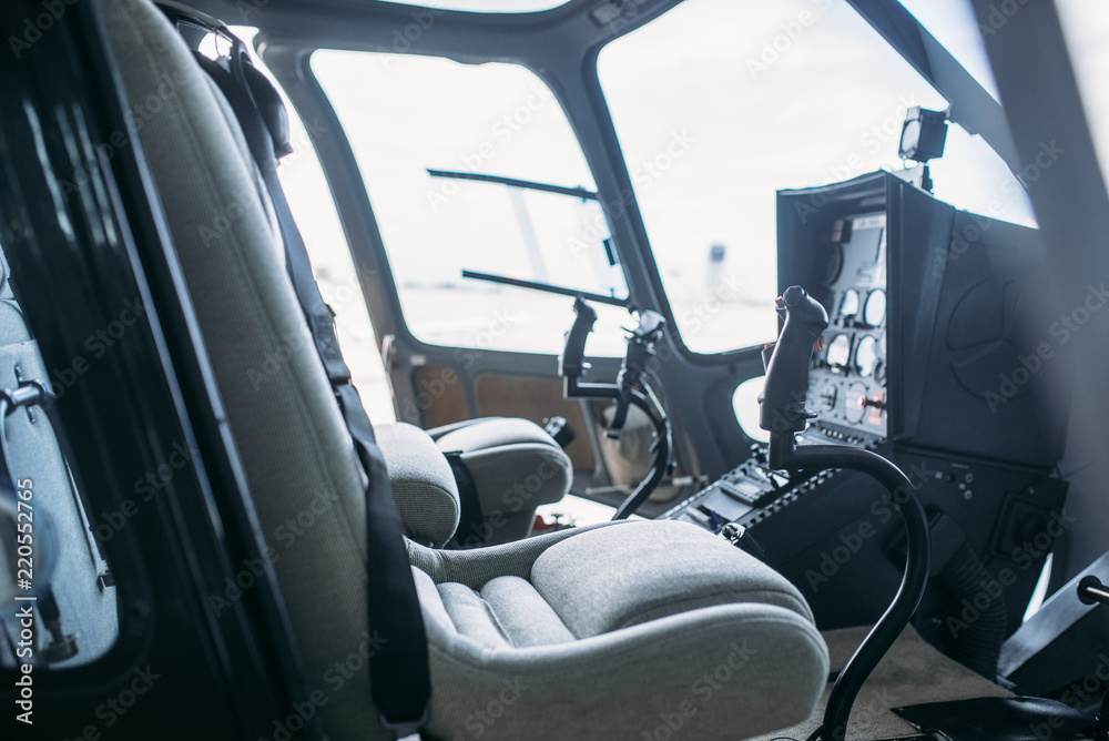 Naklejka premium Inside helicopter cabin, control panel, side view