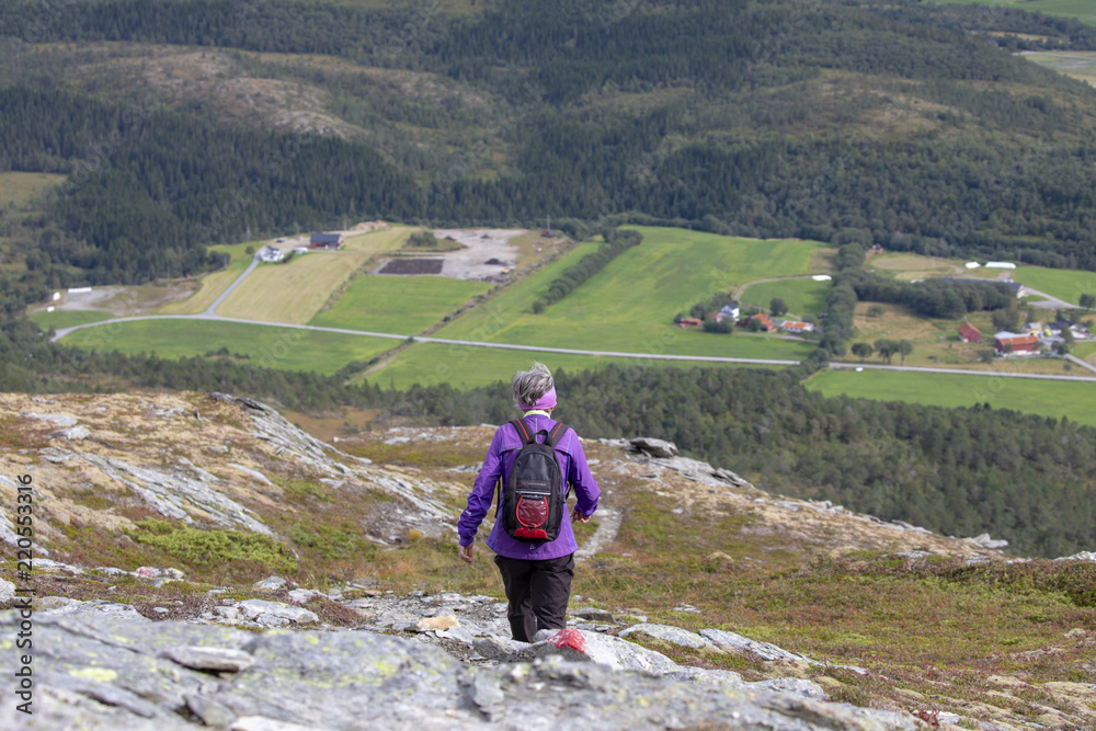 Happy walking in Norwegian mountain in Northerh Norway