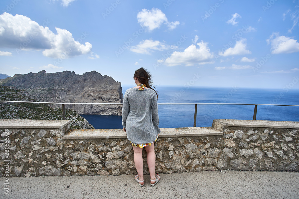 young woman portrait with Formentor Landscape, Mallorca, Balearic island, Spain young woman portrait with Formentor Landscape, Mallorca, Balearic island, Spain